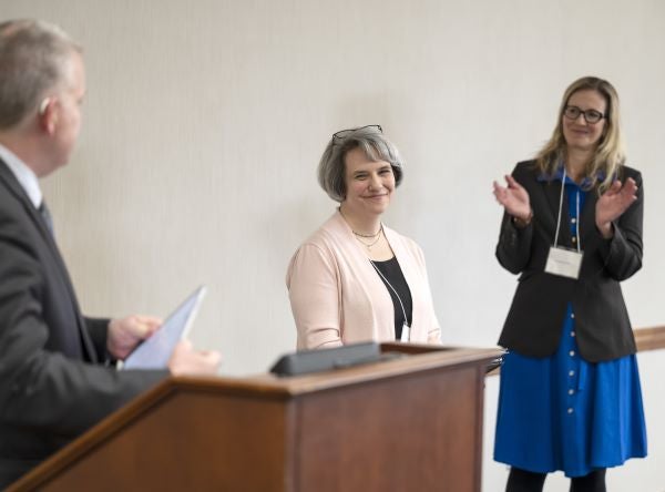  Elizabeth Skidmore receiving her award