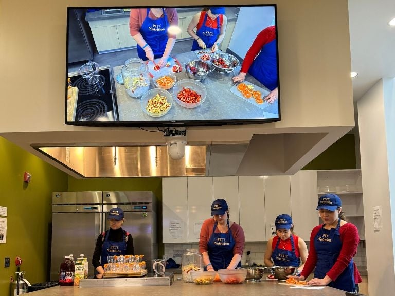 Students leading a food demonstration at the Wellness Pavilion