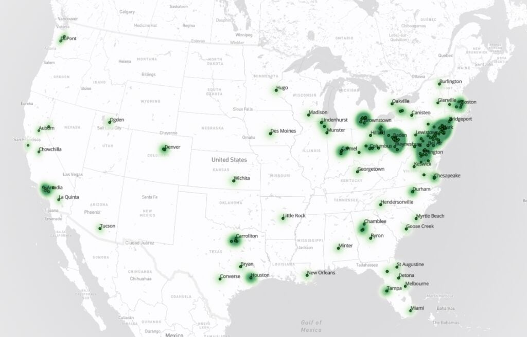 A map of the United States with shades of green showing higher density locations of student home towns