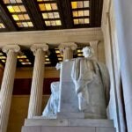 A side view of the large marble statue of Abe Lincoln