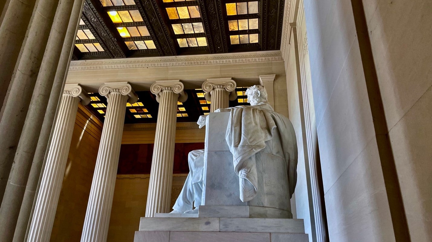 A side view of the large marble statue of Abe Lincoln