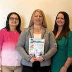 Occupational Therapy faculty Ketki Raina, Ann Marsico and Cara Lekovitch pose for a photo with the OT Practice Magazine.