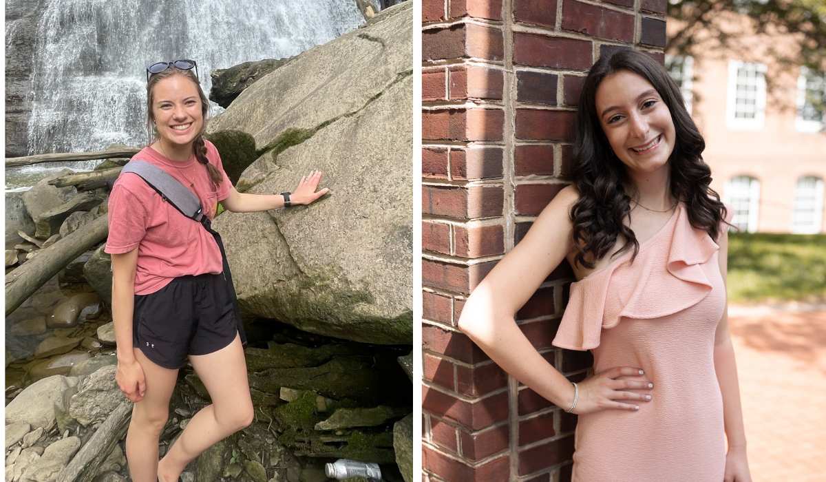 One woman with her hair in a braid wearing a pink shirt and black shorts near a waterfall and another woman with brown hair wearing a peach dress.